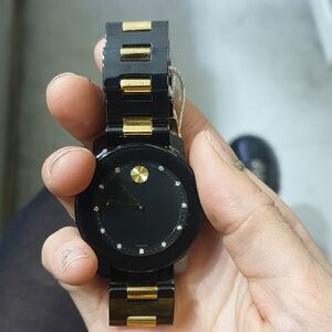 Movado Black and Gold Watch